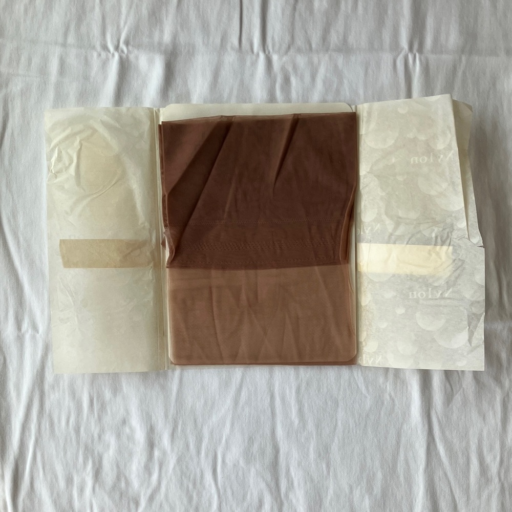 Vintage Thigh-high hosiery, new, with original tissue paper